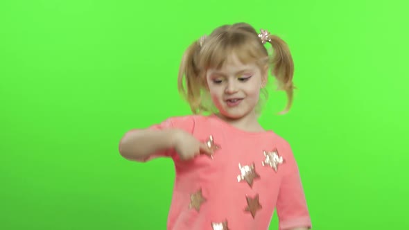 Positive Girl in Pink Blouse Dancing. Happy Four Years Old Girl. Chroma Key