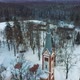 Aerial Top View of the Krimulda Evangelic Lutheran Church in Winter at Sunrise Latvia 4k Video - VideoHive Item for Sale