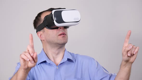 Man Wearing Virtual Reality Goggles