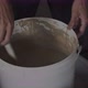 Hands Stirring Clay Bucket - VideoHive Item for Sale
