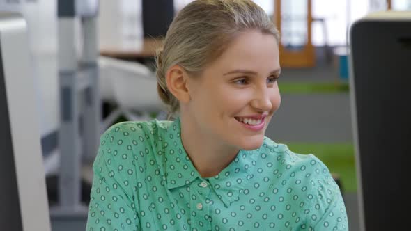 Young woman working in a creative office