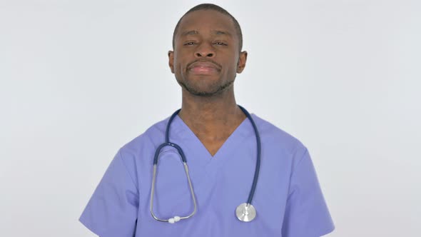 Accepting Gesture By African Doctor on White Background