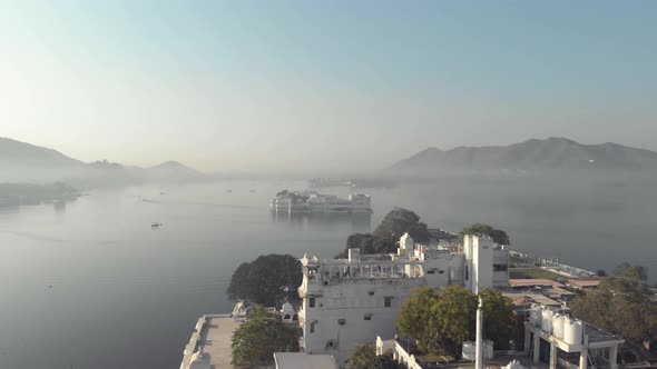 Panoramic of Lake Pichola and Taj Lake Palace from Ambrai Ghat in Udaipur, Rajasthan, India