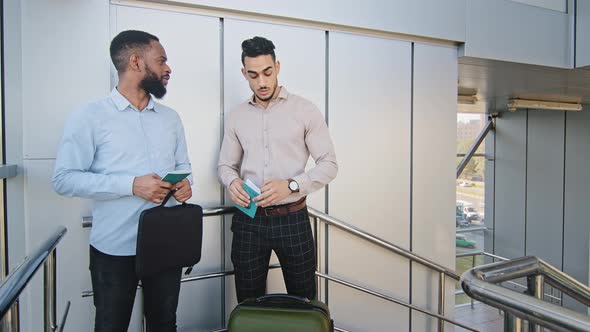Two Multiracial Business Partners Coworkers African American Man and Hispanic Guy Standing at