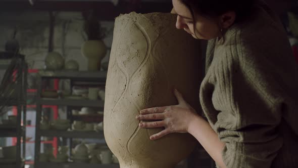 Craftswoman Is Sculpting Beautiful Vase