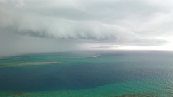 A thunderstorm approaching the coast of the island of Mauritius in the Indian Ocean