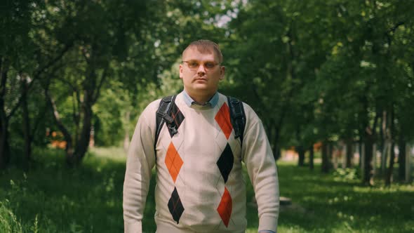 Nerdy Fat Guy Is Walking To School. Concept of Loser Nerd at University.