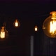 Big Vintage Incandescent Light Bulbs Hanging in the Dark Kitchen - VideoHive Item for Sale