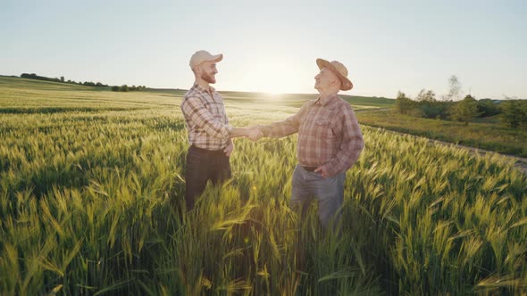 Two Farmers are Meeting and Shaking Hands