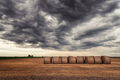 Dark clouds over the bales of hay - PhotoDune Item for Sale