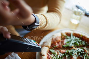 rocess of contactless paying in modern cafe