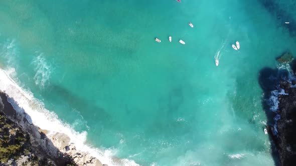 beautiful view of the bay of Cala Luna in Sardinia, white sandy beach with turquoise water (by drone