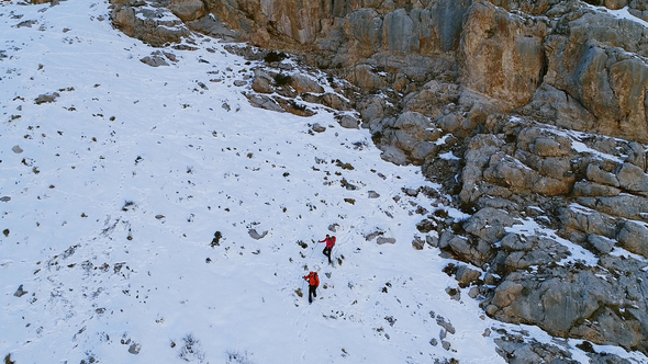 Climbers On Snowy Mountains