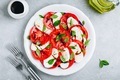 Tomato, basil, mozzarella Caprese salad with balsamic vinegar and olive oil. - PhotoDune Item for Sale