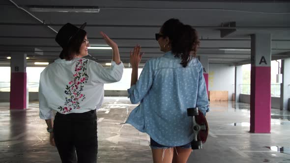 Beautiful Young Women Having Fun At Parking Lot