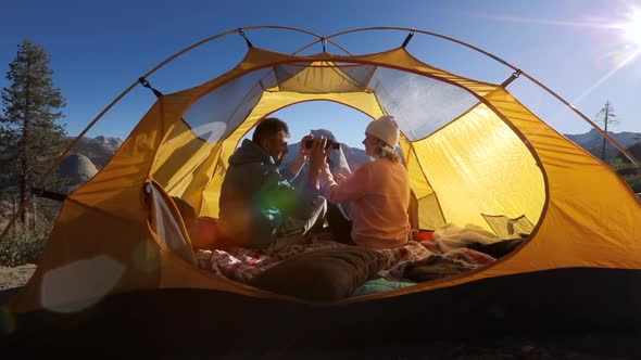 Early Morning in Yosemite Valley. A Couple in a Tent Enjoy the Beauty of Nature. Sierra Nevada, USA