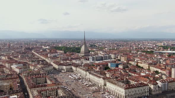Building of Mole Antonelliana and cityscape of Turin, aerial vertigo effect shot