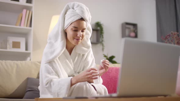 Woman Using Varnish Remover