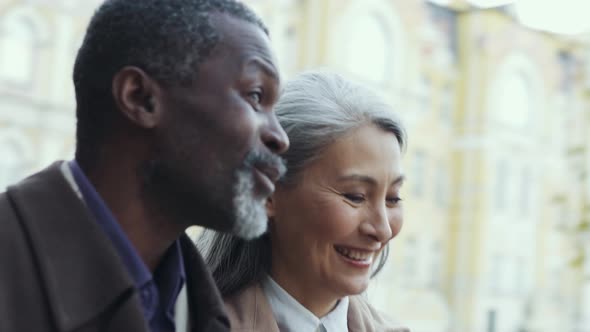 Happy multiethnic senior couple
