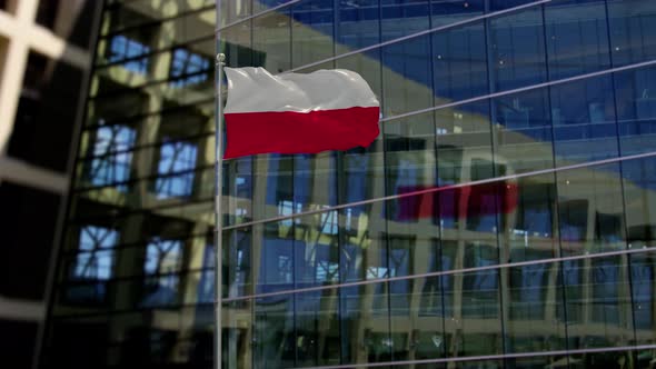 Poland Flag Waving On A Skyscraper Building