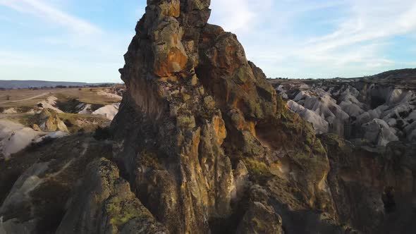 Cappadocia Aerial Drone or Balloon View to Red and Rose Valley Rock Formation Ancient Cave Churches