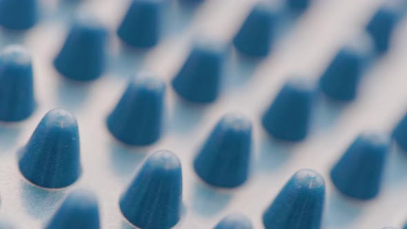 Looped Slowly Spinning Blue Rubber Spikes on Massager or Balance Disk