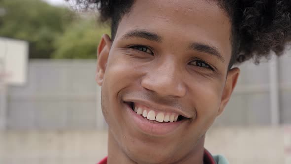 Closeup of a Teenager's Smile Looking at a Happy Camera