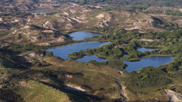 Sand dunes over a reservoir, and nature preserve, the Meijendel.