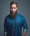 Bearded man in blue denim with serious expression - PhotoDune Item for Sale
