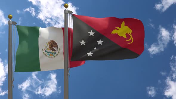 Mexico Flag Vs Papua New Guinea Flag On Flagpole