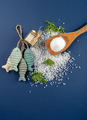Fine and coarse salt with decor on a dark blue background. - PhotoDune Item for Sale