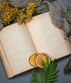 An open book with old blank pages and floral decorations. Backgr - PhotoDune Item for Sale
