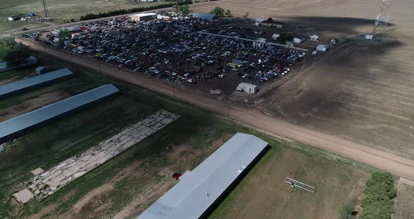 Drone flight over midwest scrapyard.  4k 60fps.