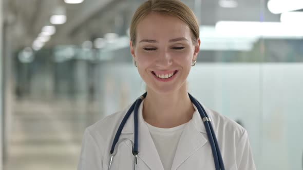 Female Doctor Saying Yes By Shaking Head