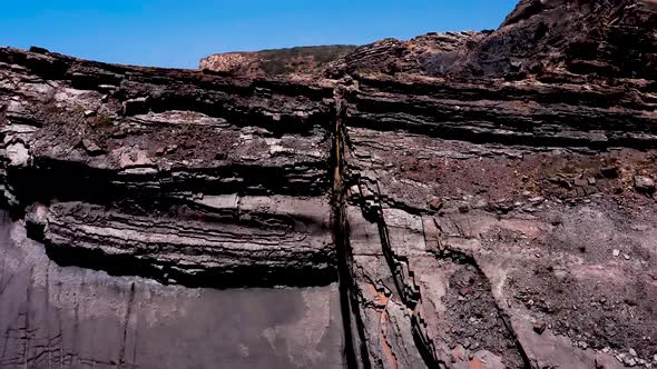 Rocky hilltop over empty beach