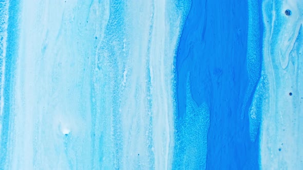 Blue and White Colorful Acrylic Paint. Fantastic Surface with Chaotic Motion Liquid. Top View. Macro