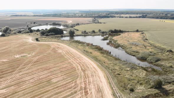 Beautiful countryside landscape with river and fields