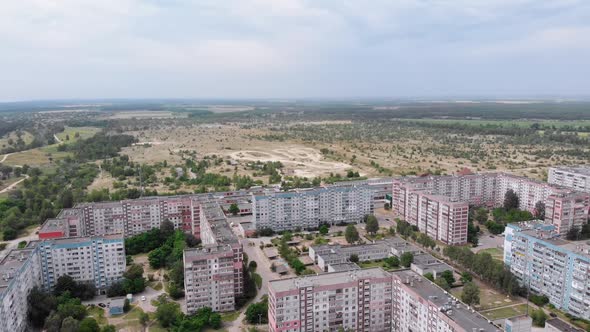 Aerial Panorama on City with Multi-Story Buildings Near Nature and River