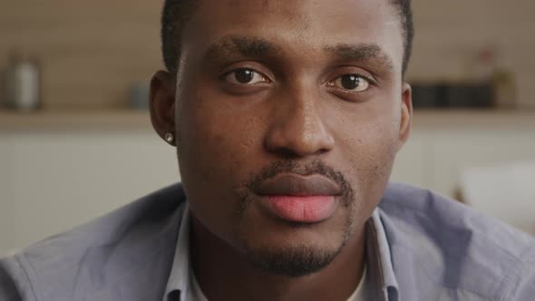 Closeup Portrait of a Young Adult Africanamerican Man Looking Straight at Camera