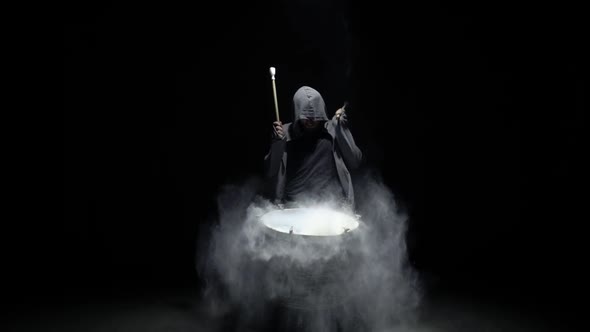 Emotional Drummer on a Black Background