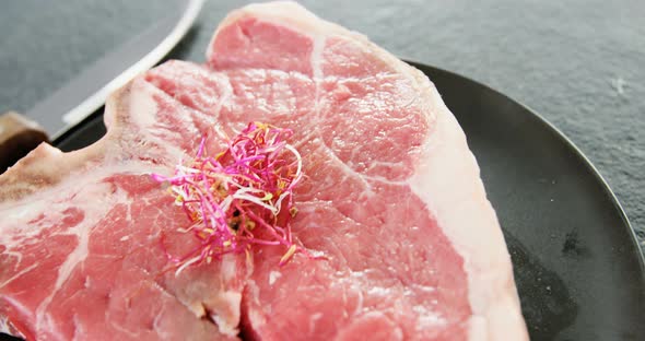 Sirloin chop garnished with shredded cabbage