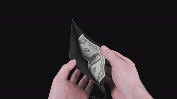 Male Hands Take Out One Dollar From an Empty Black Wallet on Alpha Channel