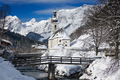 Ramsau church with Alps mountains in the snow in winter - PhotoDune Item for Sale
