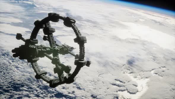 A View of the Earth and a Spaceship – ISS Is Orbiting the Earth