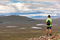 Scottish highland landscape: boy hiking in Glencoe mountain. Scotland, UK, Europe. - PhotoDune Item for Sale