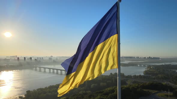 Ukrainian Flag in the Morning at Dawn. Aerial. Kyiv. Ukraine