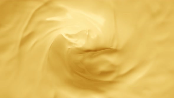 Super Slow Motion Shot of Swirling Yellow Milky Wortex at 1000Fps