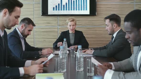 Chairwoman Leading a Meeting