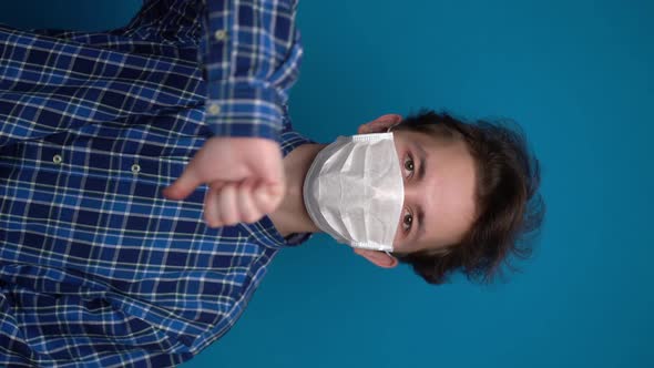 Boy Feeling Sick and Wearing Mask