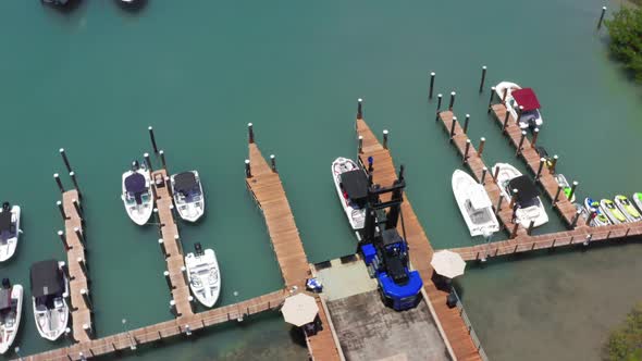  Aerial View on Boat Loader Launching the Yacht From the Ramp at Miami Harbor alt